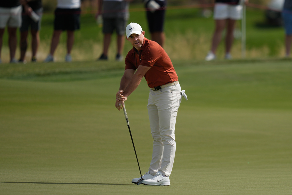 Rory McIlroy of Northern Ireland reacts after missing a putt on the 7th green during the third round of the Abu Dhabi Golf Championship in Abu Dhabi, United Arab Emirates, Saturday, Nov. 8, 2025. (AP Photo/Altaf Qadri)