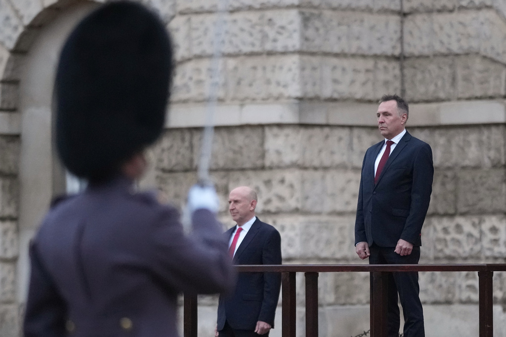 Norway's Minister of Defence Tore O. Sandvik, right, and Britain's Secretary of State for Defence John Healey inspect a guard of honour in Horse Guards Parade in London, Thursday, Dec. 4, 2025. (AP Photo/Alastair Grant, pool)