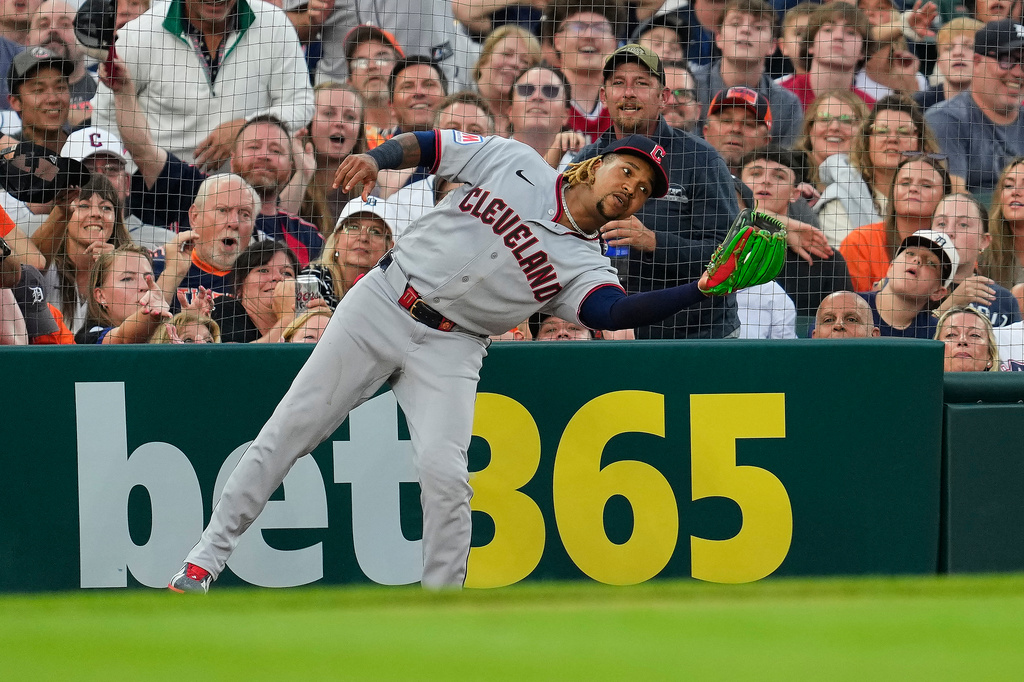 Cleveland Guardians third baseman José Ramírez catches a Detroit Tigers' Colt Keith fly ball in foul territory for an out during the sixth inning of a baseball game Tuesday, Aug. 11, 2026, in Detroit. (AP Photo/Paul Sancya)