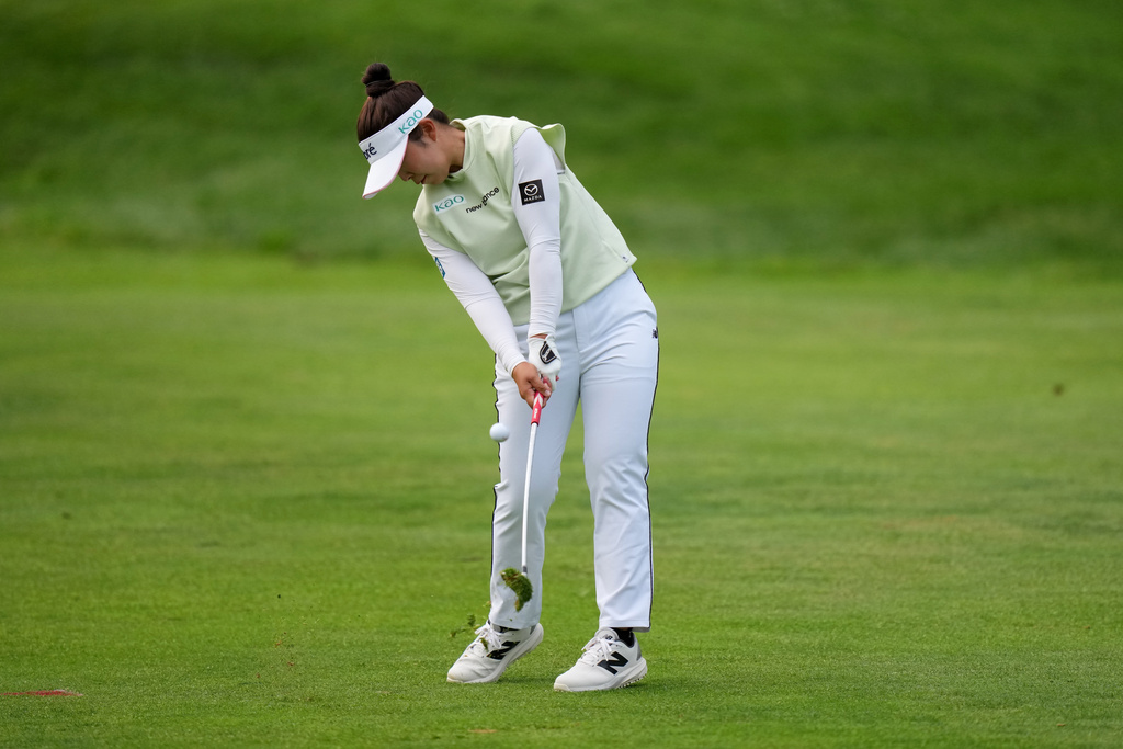 Miyu Yamashita, of Japan, hits her second shot on the 15th hole during the final round at the LPGA Canadian Women's Open golf tournament in Edmonton, Alberta, Sunday, Aug. 23, 2026. (Darryl Dyck/The Canadian Press via AP)