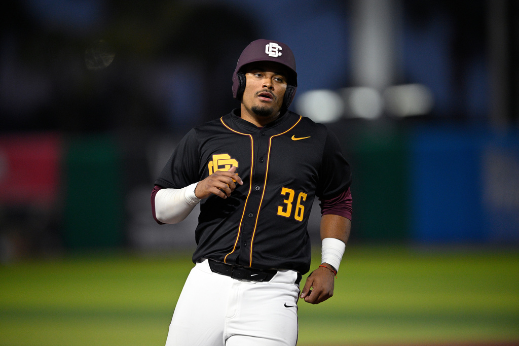 FILE - Bethune-Cookman's Andrey Martinez (36) runs the bases during an NCAA college baseball game against Bradley, Feb. 14, 2026, in Daytona Beach, Fla. (AP Photo/Phelan M. Ebenhack, File)