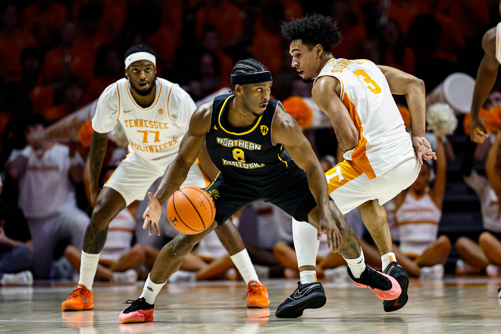 Northern Kentucky guard Donovan Oday (8) works against Tennessee guard Bishop Boswell (3) during the first half of an NCAA college basketball game Saturday, Nov. 8, 2025, in Knoxville, Tenn. (AP Photo/Wade Payne)