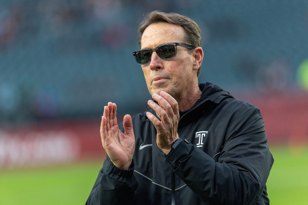 Temple head coach K.C. Keeler watches warmups before an NCAA college football game against Tulane, Saturday, Nov. 22, 2025, in Philadelphia. (AP Photo/Laurence Kesterson)