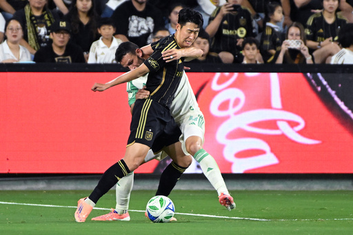 LAFC forward Son Heung-Min (7) battles for the ball with Austin FC midfielder Besard Sabović during the first half of Game 1 in the first round of MLS soccer's Western Conference playoff Wednesday, Oct.. 29, 2025, in Los Angeles. (AP Photo/Wally Skalij) LAFC forward Son Heung-Min (7) battles for the ball with Austin FC midfielder Besard Sabović during the first half of Game 1 in the first round of MLS soccer's Western Conference playoff Wednesday, Oct.. 29, 2025, in Los Angeles. (AP Photo/Wally Skalij)