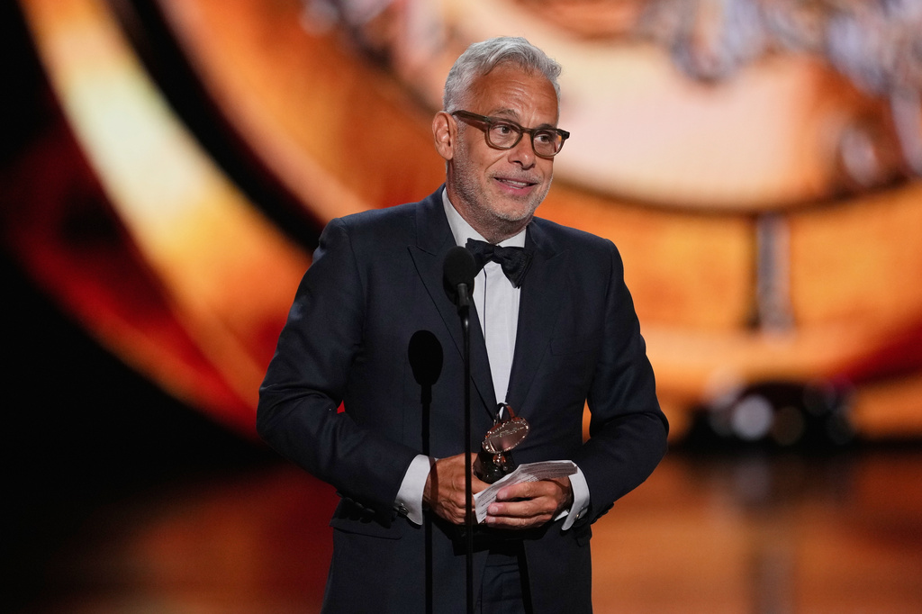 Joe Mantello accepts the award for best direction of a play for "Death of a Salesman" during the 79th Tony Awards on Sunday, June 7, 2026, at Radio City Music Hall in New York. (Photo by Charles Sykes/Invision/AP)