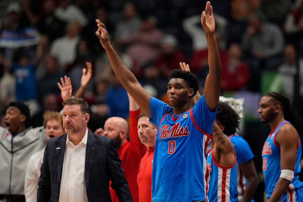 Mississippi forward Malik Dia (0) and team celebrate a basket against Alabama during the second half of an NCAA college basketball game in the quarterfinal round of the Southeastern Conference tournament, Friday, March 13, 2026, in Nashville, Tenn. (AP Photo/George Walker IV)