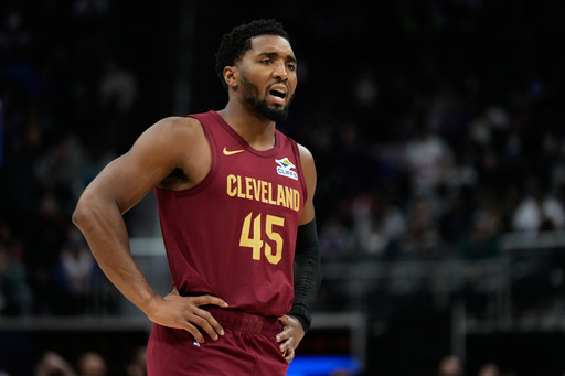 Cleveland Cavaliers guard Donovan Mitchell reacts during the first half of an NBA basketball game against the Detroit Pistons, Monday, Oct. 27, 2025, in Detroit. (AP Photo/Ryan Sun) Cleveland Cavaliers guard Donovan Mitchell reacts during the first half of an NBA basketball game against the Detroit Pistons, Monday, Oct. 27, 2025, in Detroit. (AP Photo/Ryan Sun)