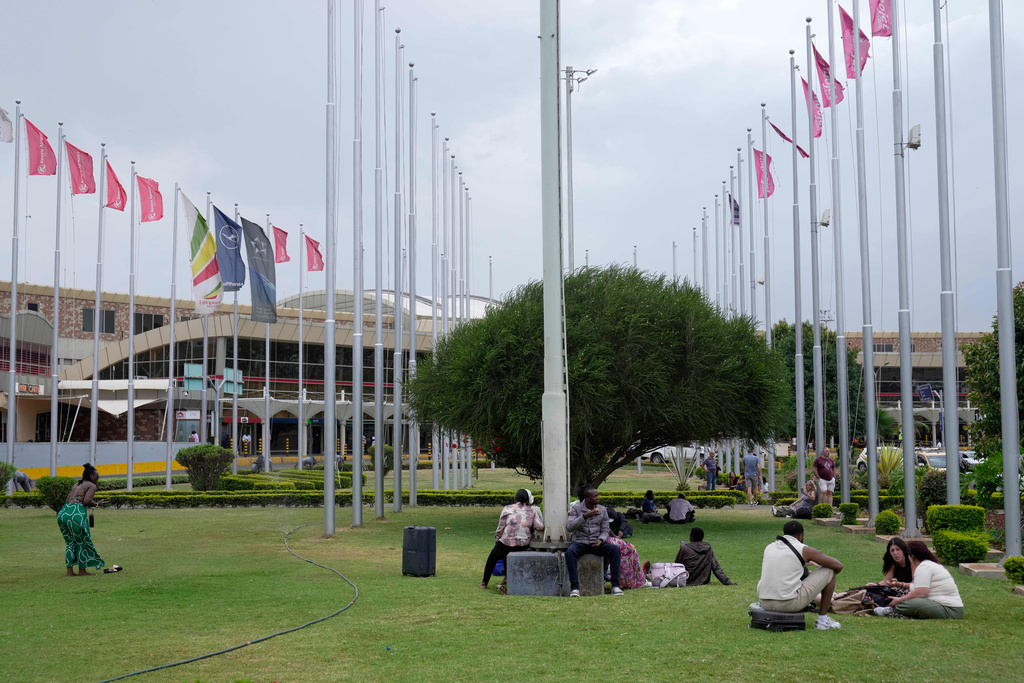 Passengers wait for their delayed flights at Jomo Kenyatta International Airport (JKIA) in Nairobi, Kenya, Monday, Feb. 16, 2026. (AP Photo/Brian Inganga)