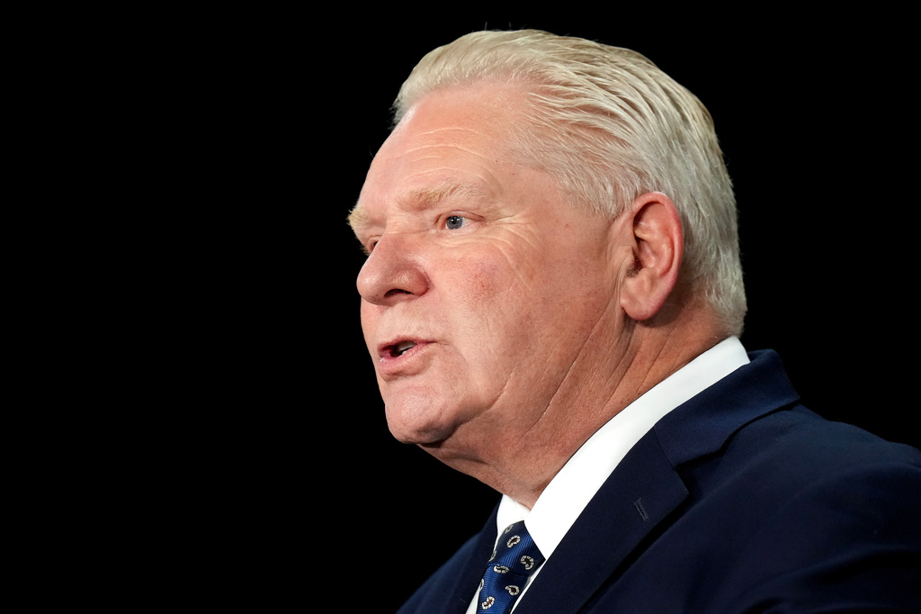 FILE - Ontario Premier Doug Ford speaks to the media regarding the federal governments decision to allow Chinese EV's into Canada at Queen's Park in Toronto on Wednesday, Jan. 21, 2026. (Nathan Denette/The Canadian Press via AP, File)