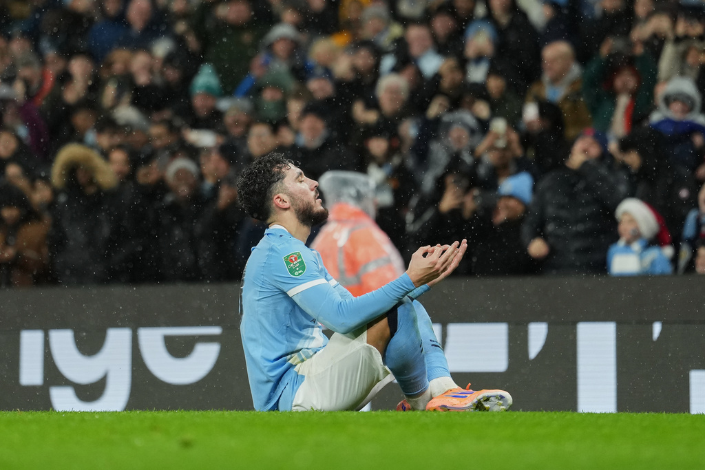 Manchester City's Rayan Cherki celebrates after scoring his side's first goal during the English League Cup soccer match between Manchester City and Brentford in Manchester, England, Wednesday, Dec. 17, 2025. (AP Photo/Jon Super)
