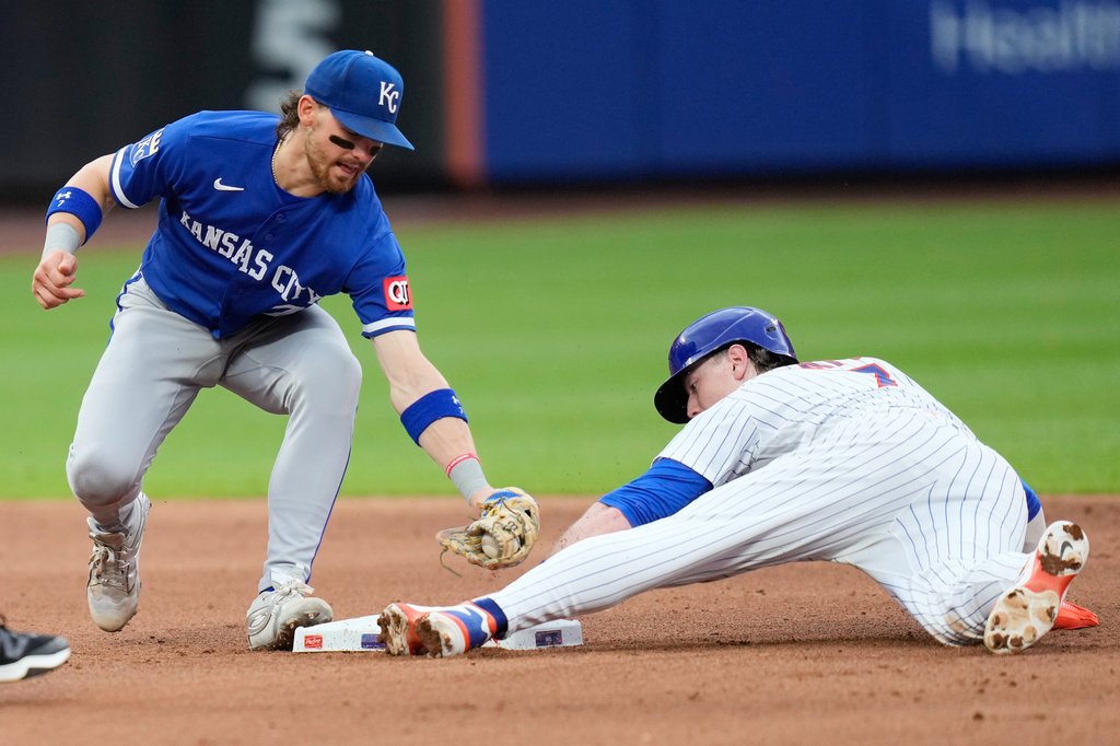 New York Mets' Brett Baty, right, steals second base in front of Kansas City Royals shortstop Bobby Witt Jr. during the fifth inning of a baseball game, Thursday, July 9, 2026, in New York. (AP Photo/Seth Wenig)