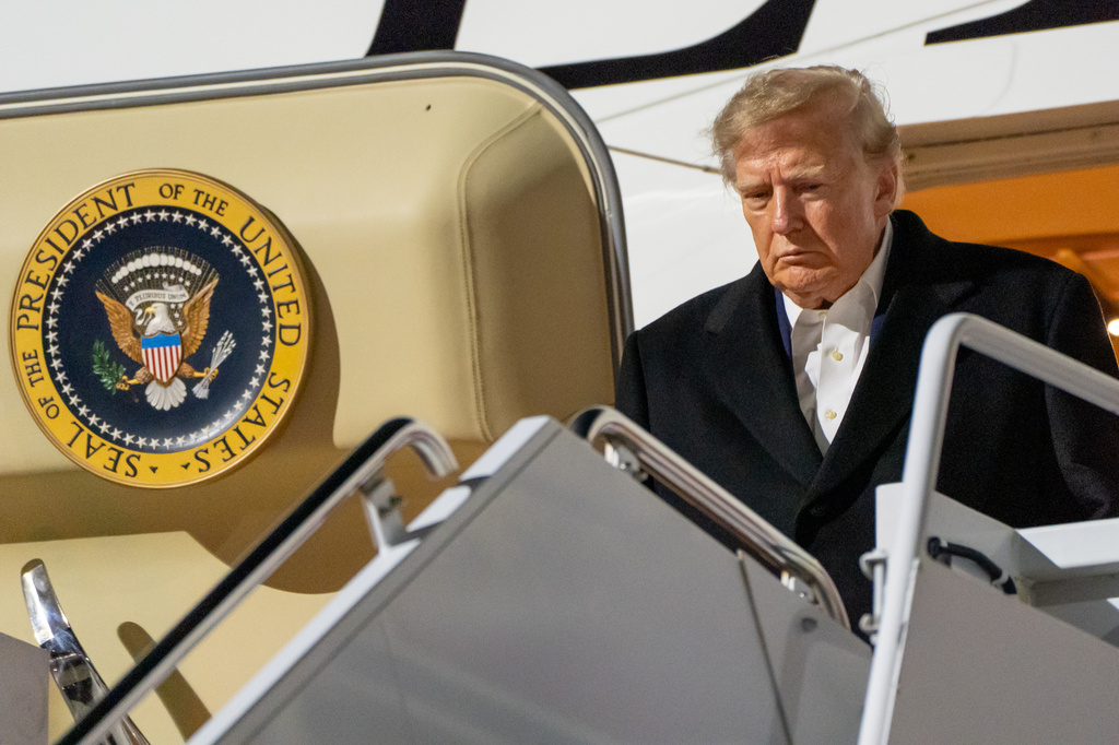 President Donald Trump arrives at Harry Reid International Airport, Wednesday, Oct. 14, 2026, in Las Vegas, Nev. (AP Photo/Alex Brandon)