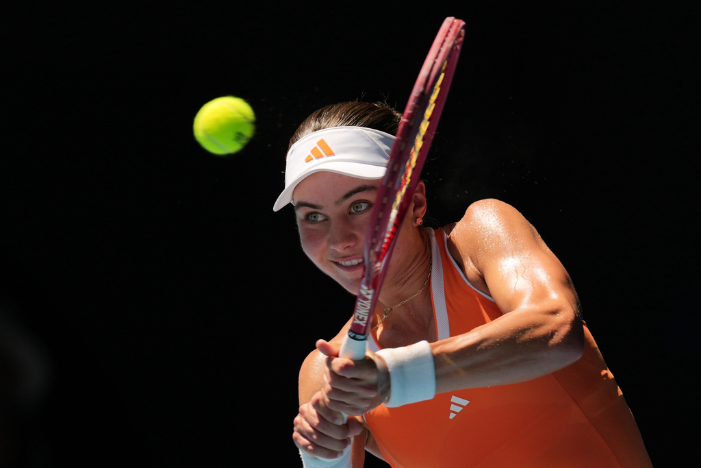 Iva Jovic of the U.S. plays a backhand return to Aryna Sabalenka of Belarus during their quarterfinal match at the Australian Open tennis championship in Melbourne, Australia, Tuesday, Jan. 27, 2026. (AP Photo/Dita Alangkara)