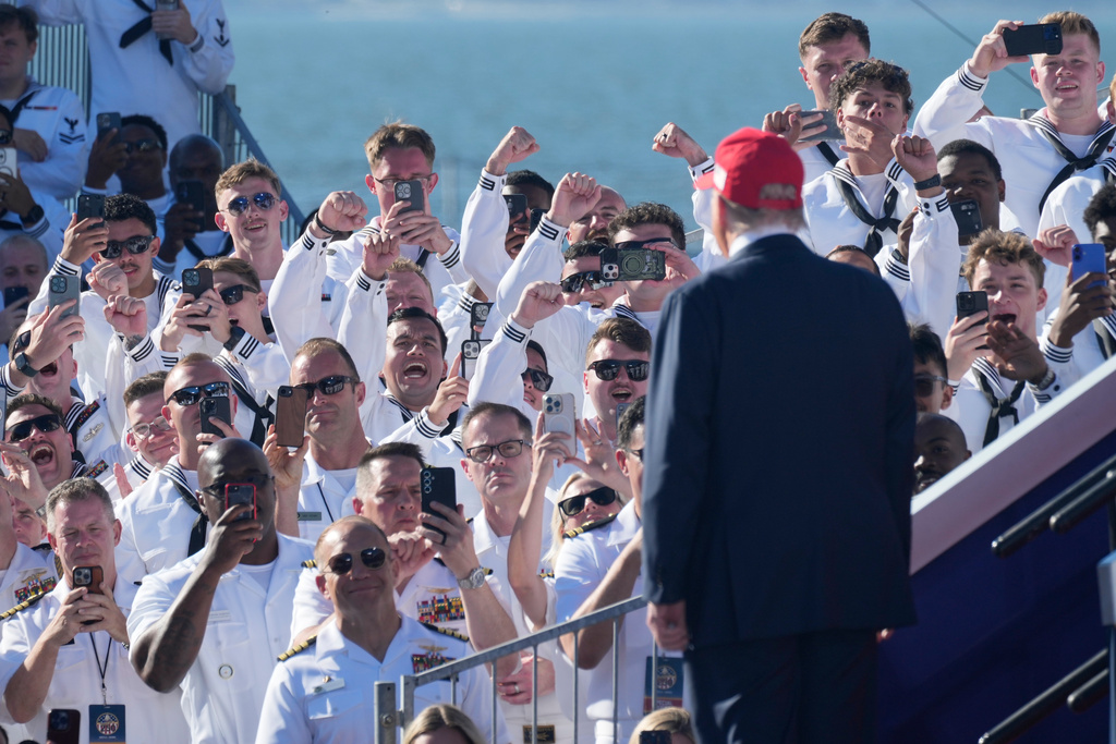 President Donald Trump arrives to speak during a celebration for the 250th anniversary of the U.S. Navy aboard the USS Harry S. Truman at Naval Station Norfolk, Sunday Oct. 5, 2025 in Norfolk, Va. (AP Photo/Steve Helber)