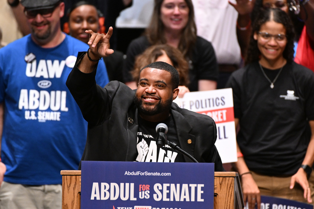Michigan state Rep. Donavan McKinney, D-Detroit, waves at the crowd during a campaign rally for Michigan Democratic U.S. Senate primary candidate Abdul El-Sayed, Saturday, July 18, 2026, in Detroit. (AP Photo/Jose Juarez)