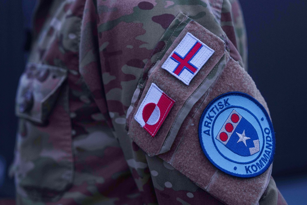 A patch of the Joint Arctic Command is seen on o jacket of Major General Søren Andersen standing onboard a military vessel HDMS Knud Rasmussen of the Royal Danish Navy docked in Nuuk, Greenland, on Saturday, Jan. 17, 2026. (AP Photo/Evgeniy Maloletka)