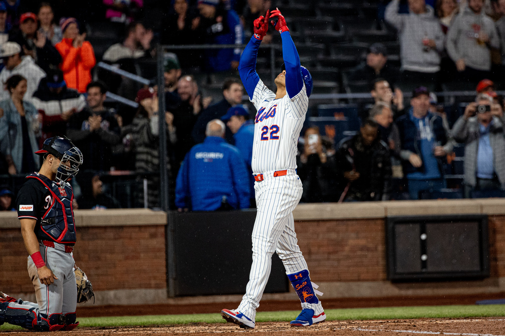 New York Mets' Juan Soto (22) celebrates scoring a two-run home run during the fourth inning of a baseball game against the Washington Nationals, Tuesday, April 28, 2026, in New York. (AP Photo/Angelina Katsanis)