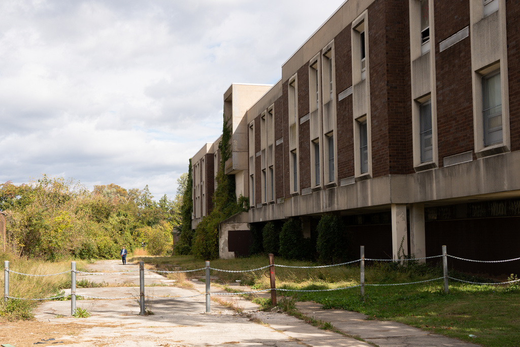 Investigators inspect the abandoned Ada H. H. Lewis Middle School on Monday, Oct. 20, 2025, in Philadelphia, where the body of Kada Scott was found earlier. (AP Photo/Mingson Lau)