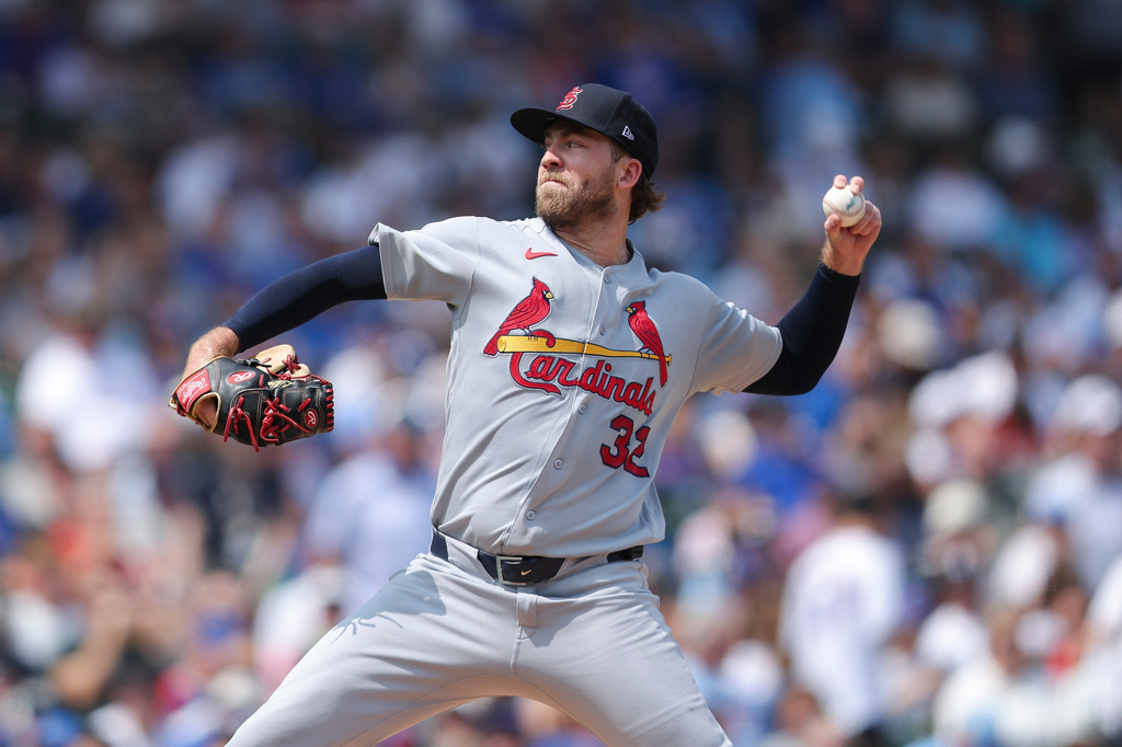 St. Louis Cardinals pitcher Matthew Liberatore (32) throws to a Chicago Cubs batter during the first inning of a baseball game in Chicago, Friday, Aug. 14, 2026. (AP Photo/Jessie Alcheh)