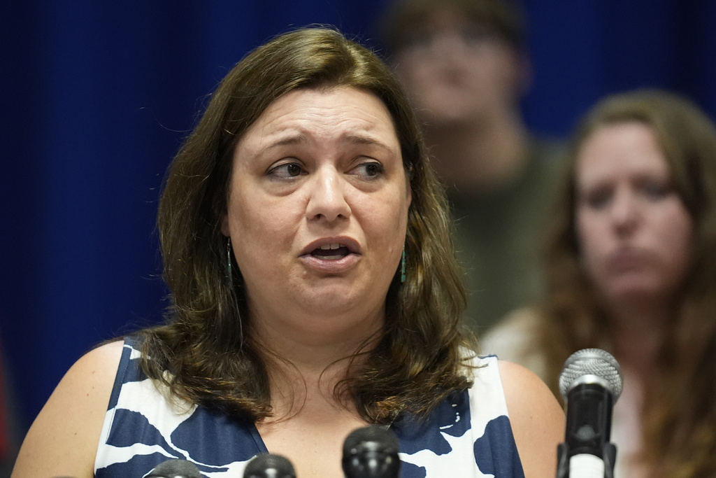 Cynthia Young, who lost a husband and son in the October 2023 mass shooting, speaks at a news conference, Wednesday, Sept. 3, 2025, in Lewiston, Maine. (AP Photo/Robert F. Bukaty)