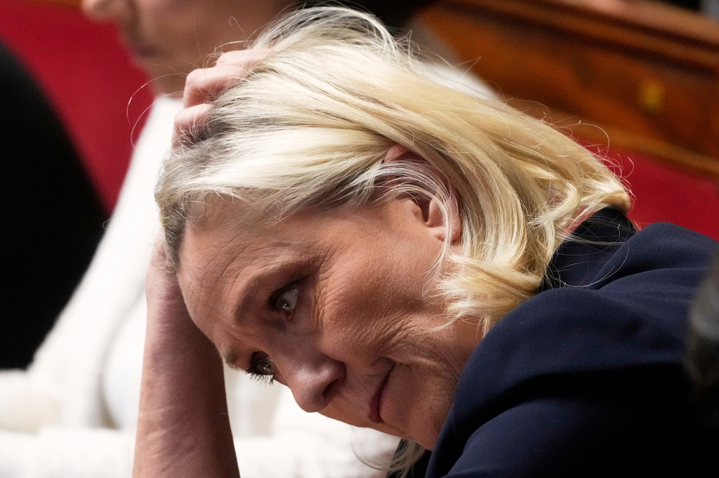 FILE- French far-right leader Marine Le Pen reacts at the National Assembly during a session on April 1, 2025 in Paris. (AP Photo/Michel Euler, File)