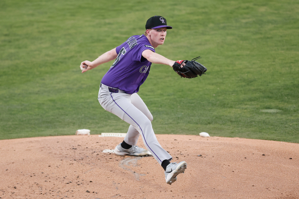 Colorado Rockies starting pitcher Sean Sullivan (45) throws during the first inning of a baseball game against the Athletics, Friday, June 12, 2026, in Las Vegas. (AP Photo/Caroline Brehman)