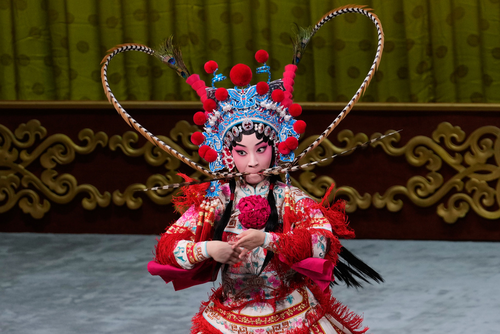 Peking Opera actress Zhang Wanting performs during a show at Jixiang Theatre in Beijing, China, Sunday, Sept. 7, 2025. (AP Photo/Mahesh Kumar A.)