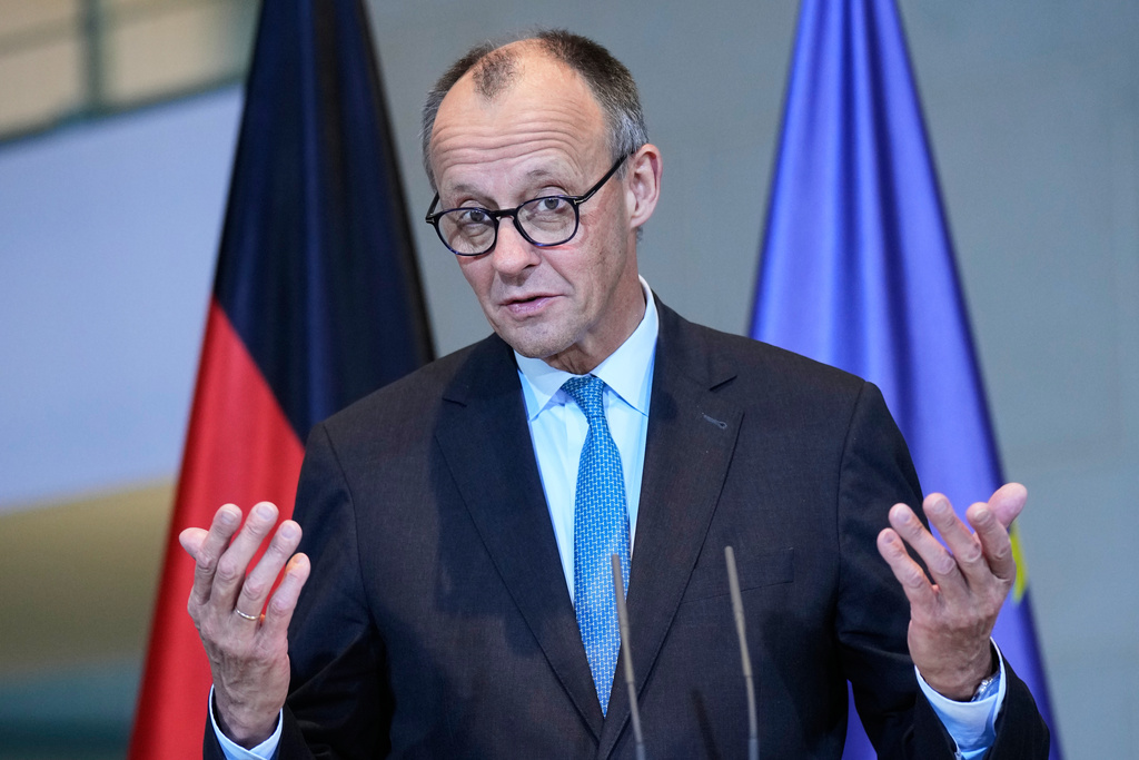 German Chancellor Friedrich Merz briefs the media in Berlin, Germany, Wednesday, Nov. 19, 2025. (AP Photo/Ebrahim Noroozi)
