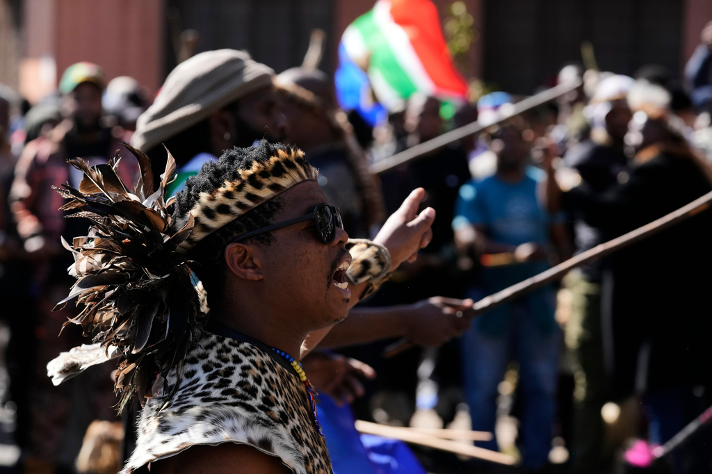 Protesters march against illegal immigration, in Johannesburg, South Africa, Tuesday, June 30, 2026. (AP Photo/Themba Hadebe)