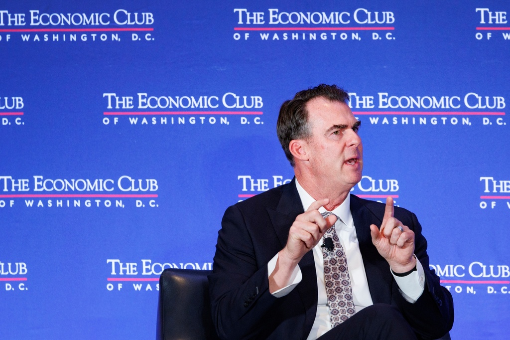 Gov. Kevin Stitt, R-Okla., chair of the National Governors Association (NGA) speaks during a conference at the Economic Club of Washington Wednesday, Feb. 18, 2026, in Washington.(AP Photo/Tom Brenner)