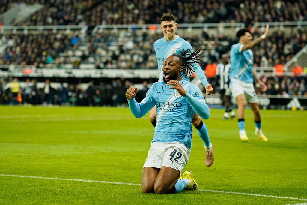 Manchester City's Antoine Semenyo celebrates after scoring his side's opening goal during the English League Cup semifinal first leg soccer match between Newcastle and Manchester City in Newcastle, England, Tuesday, Jan. 13, 2026. (AP Photo/Dave Thompson)