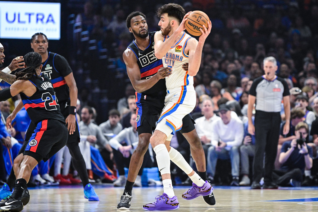 Oklahoma City Thunder center/forward Chet Holmgren (7) pressures during the first half of an NBA basketball game against the Detroit Pistons Monday, March. 30, 2026, in Oklahoma City. (AP Photo/Gerald Leong)