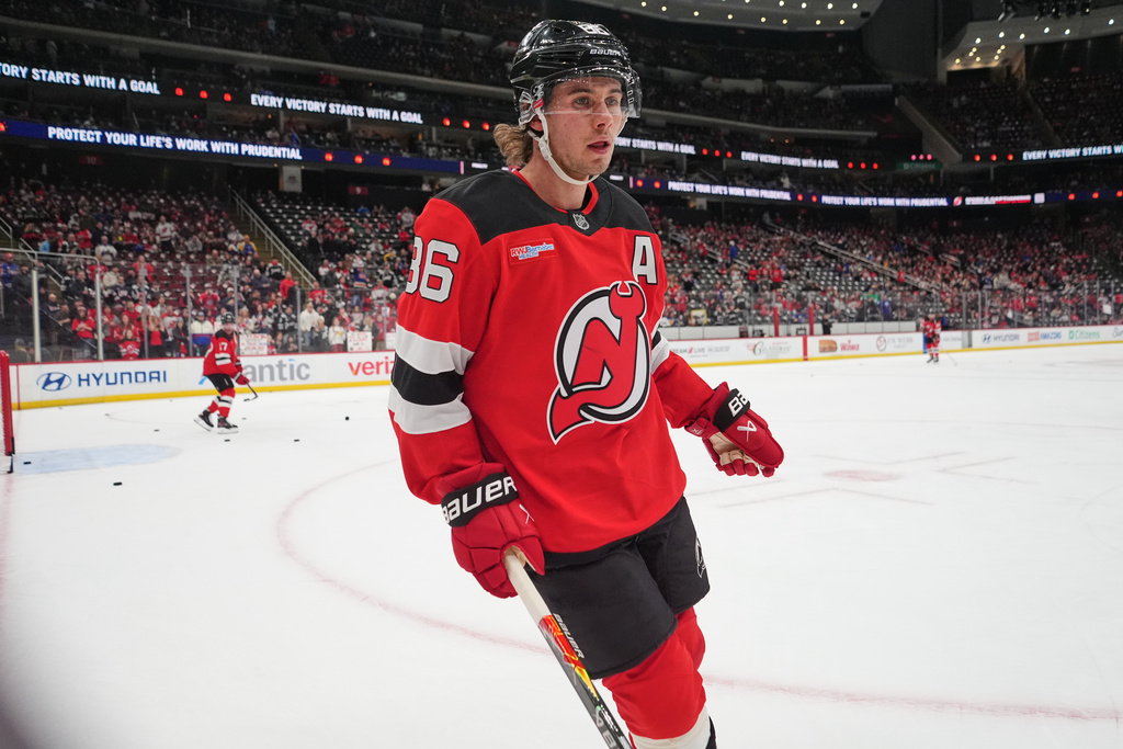 New Jersey Devils' Jack Hughes (86) leaves the ice before an NHL hockey game against the Buffalo Sabres Wednesday, Feb. 25, 2026, in Newark, N.J. (AP Photo/Frank Franklin II)