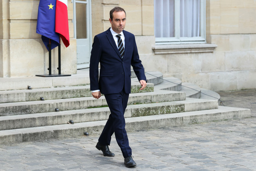 French Prime Minister Sebastien Lecornu arrives to deliver a statement at the Hotel Matignon in Paris, Friday Oct. 3, 2025, before a round of consultations with political parties ahead of the announcement of the new government. (Alain Jocard, Pool Photo via AP) French Prime Minister Sebastien Lecornu arrives to deliver a statement at the Hotel Matignon in Paris, Friday Oct. 3, 2025, before a round of consultations with political parties ahead of the announcement of the new government. (Alain Jocard, Pool Photo via AP)