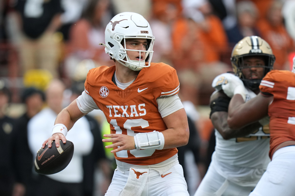 Texas quarterback Arch Manning (16) looks to throw against Vanderbilt during the second half of an NCAA college football game in Austin, Texas, Saturday, Nov. 1, 2025. (AP Photo/Eric Gay)