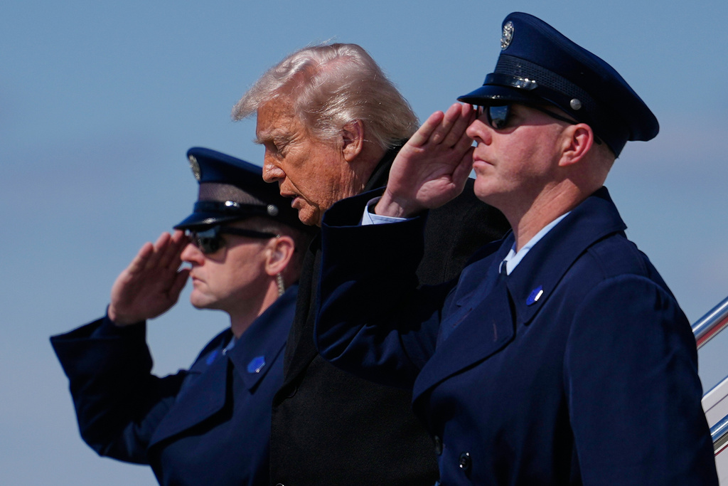 President Donald Trump arrives on Air Force One, Wednesday, March 18, 2026, at Dover Air Force Base, Del., to attend the casualty return for the six crew members of an Air Force refueling aircraft who died when their plane crashed in western Iraq while supporting operations against Iran. (AP Photo/Julia Demaree Nikhinson)