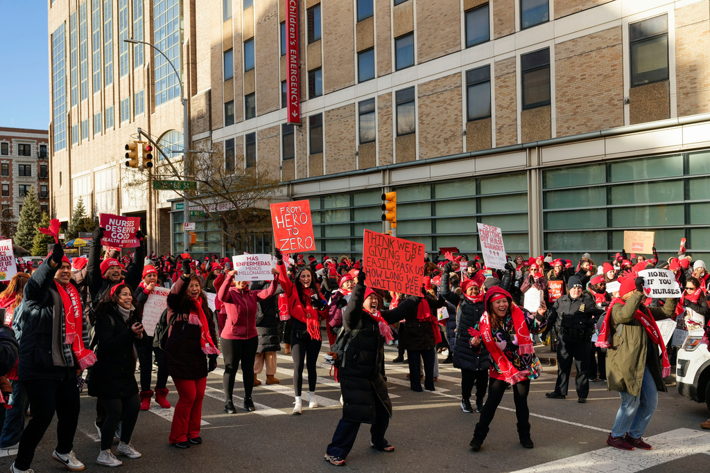 Nurses strike outside New York-Presbyterian Hospital, Monday, Jan. 12, 2026, in New York. (AP Photo/Yuki Iwamura)