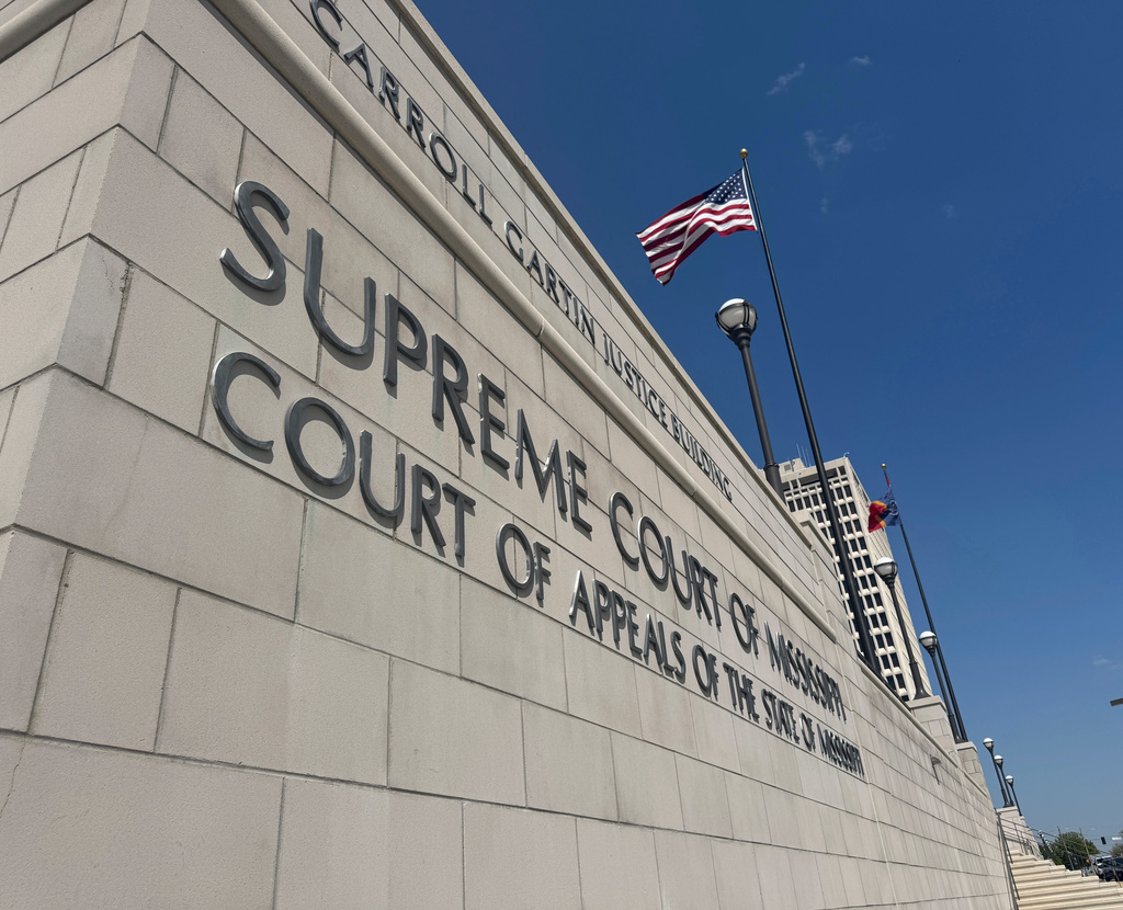 FILE - The American flag waves outside the Mississippi Supreme Court in Jackson, Miss., April 17, 2025. (AP Photo/Sophie Bates, File)