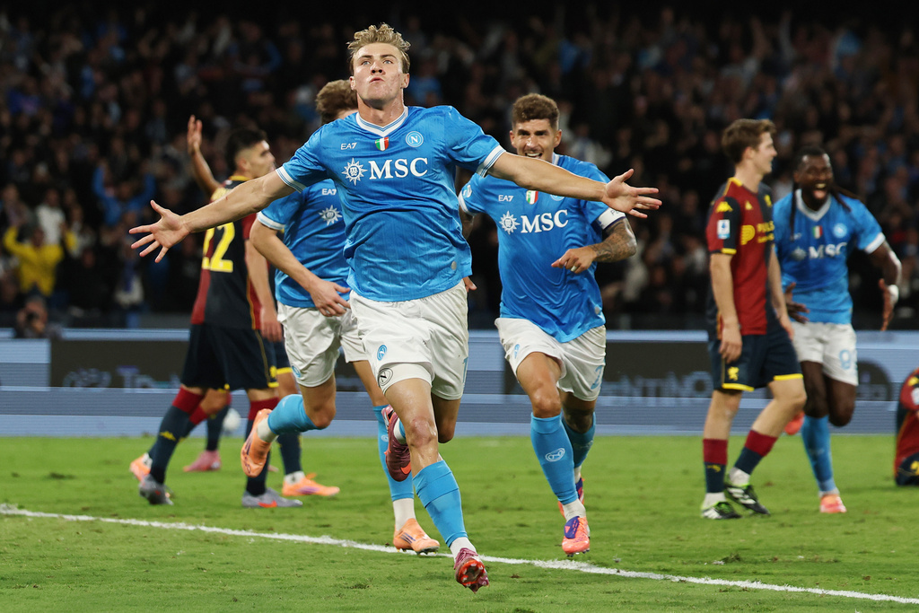 Napoli's Rasmus Hojlund celebrates after scoring during the Italian Serie A soccer match between Napoli and Genoa at the Diego Armando Maradona Stadium in Naples, Italy, Sunday, Oct. 5 , 2025. (Alessandro Garofalo/LaPresse via AP)