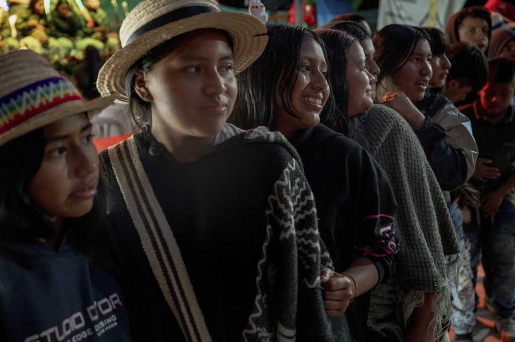 Participants in the Indigenous youth assembly gather to vote on coordinator of the youth movement July 12, 2025, in the conflict-hit reserve of Las Delicias, in Cauca, Colombia. (AP Photo/Nadège Mazars)