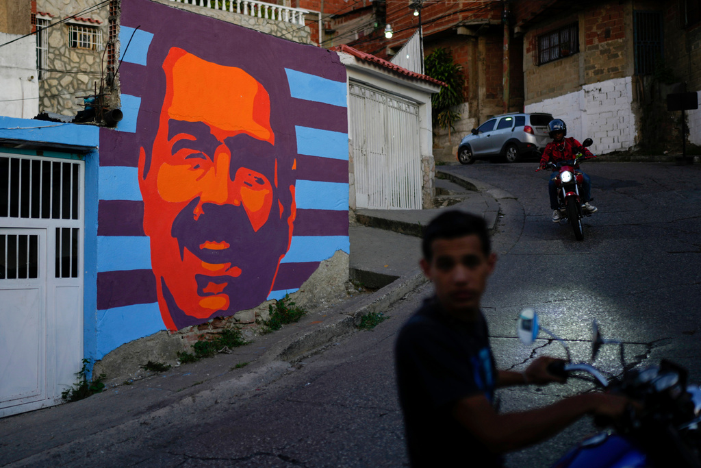 FILE - A campaign mural promotes Venezuelan President Nicolas Maduro, who is seeking a third term, in Caracas, Venezuela, July 17, 2024. (AP Photo/Ariana Cubillos, File)