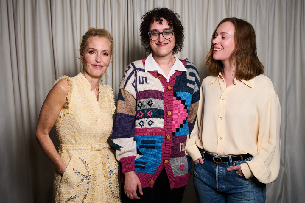 Gillian Anderson, from left, director Jane Schoenbrun, and Hannah Einbinder pose for portrait photographs for the film 'Teenage Sex and Death at Camp Miasma' during the 79th international film festival, Cannes, southern France, Tuesday, May 12, 2026. (Photo by Scott A Garfitt/Invision/AP)