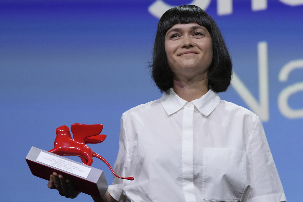 Director Nastia Korkia accepts the Lion of the future award for best debut film for 'Short Summer' during the awards ceremony of the 82nd edition of the Venice Film Festival in Venice, Italy, on Saturday, Sept. 6, 2025. (Photo by Alessandra Tarantino/Invision/AP)
