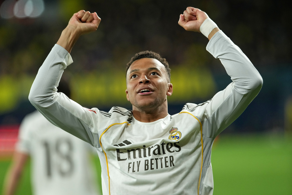 Real Madrid's Kylian Mbappe celebrates after scoring the opening goal during a Spanish La Liga soccer match between Villarreal and Real Madrid in Villarreal, Spain, Saturday, Jan. 24, 2026. (AP Photo/Alberto Saiz)