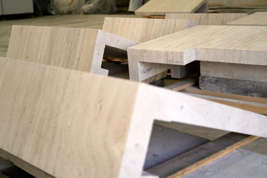 Sections of travertine that will be used to adorn the tower of the new Manhattan Mormon temple in New York City are seen inside the Mariotti Carlo SpA stonecutting firm near Tivoli, Italy, 35 kilometers east of Rome, on Friday, Feb. 13, 2026. (AP Photo/Gregorio Borgia)