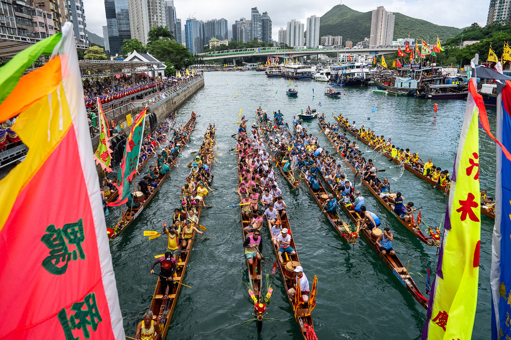 Competitors take part in the Aberdeen Dragon Boat Race to celebrate the Dragon Boat Festival in Hong Kong, Friday, June 19, 2026. (AP Photo/Chan Long Hei)