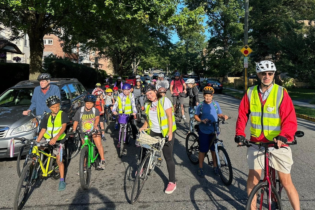 Children ride their bicycles to school during a parent-led bike ride titled "Bike Bus" Sept. 15, 2025, in Montclair, N.J. (Andrew Hawkins/Montclair Bike Bus via AP)