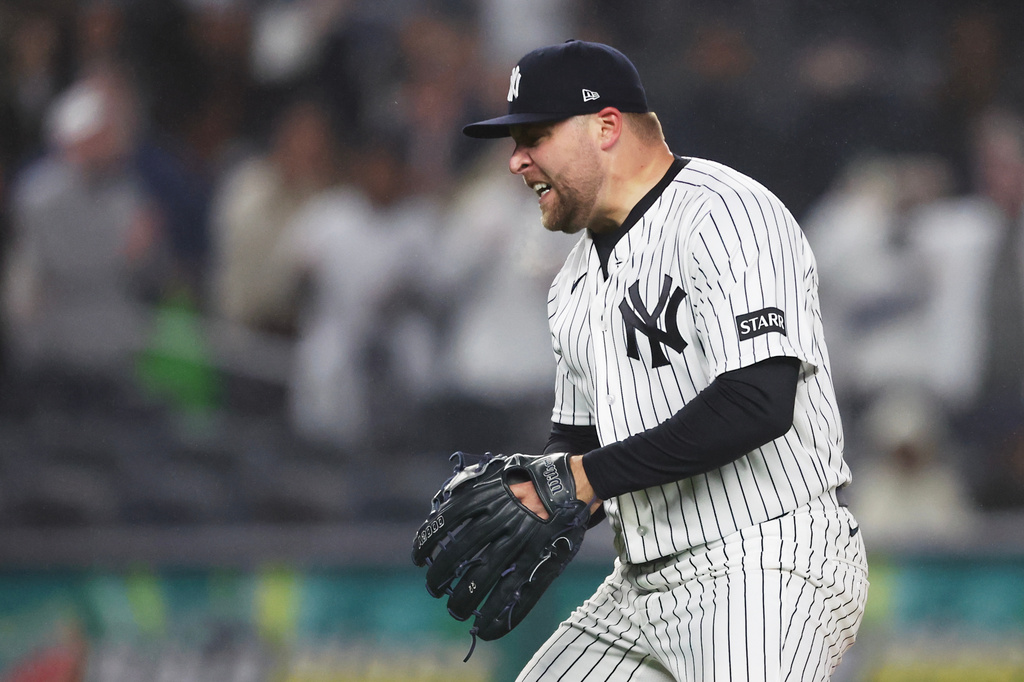 New York Yankees pitcher David Bednar reacts after a strikeout to end the game in the ninth inning of a baseball game against the Miami Marlins, Saturday, April 4, 2026, in New York. (AP Photo/Heather Khalifa)