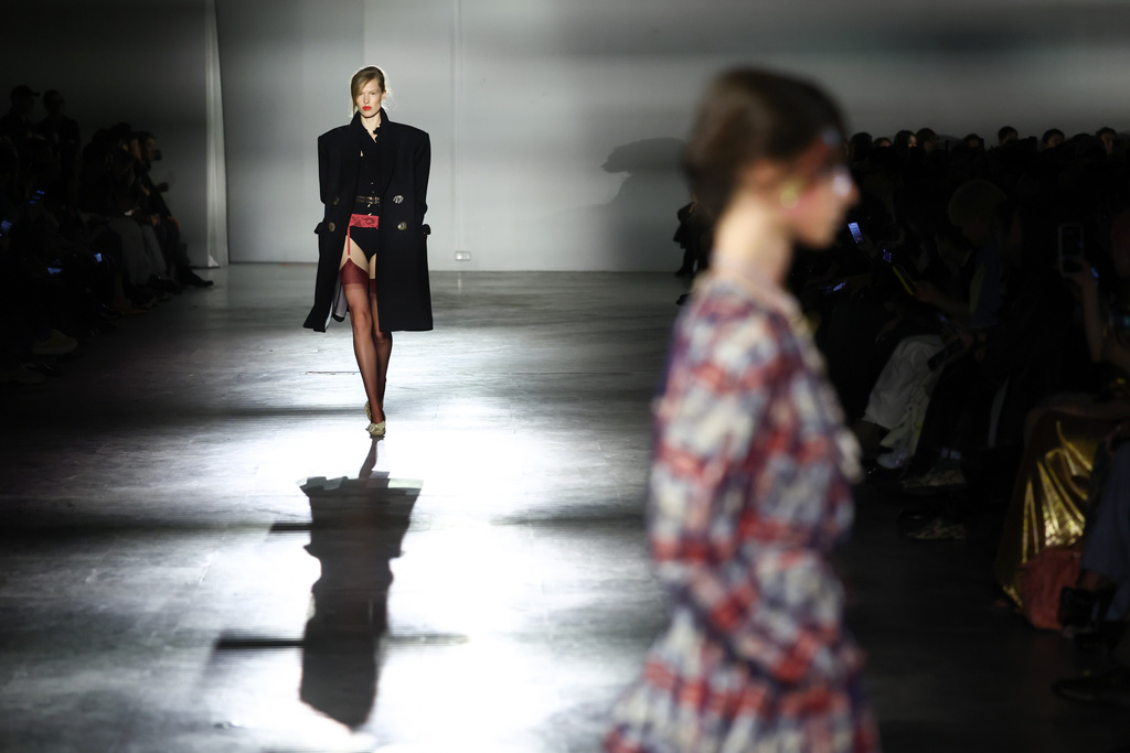 A model wears a creation from the Vivienne Westwood Fall/Winter 2026-2027 Women's collection presented in Paris, Saturday, March 7, 2026. (AP Photo/Tom Nicholson)