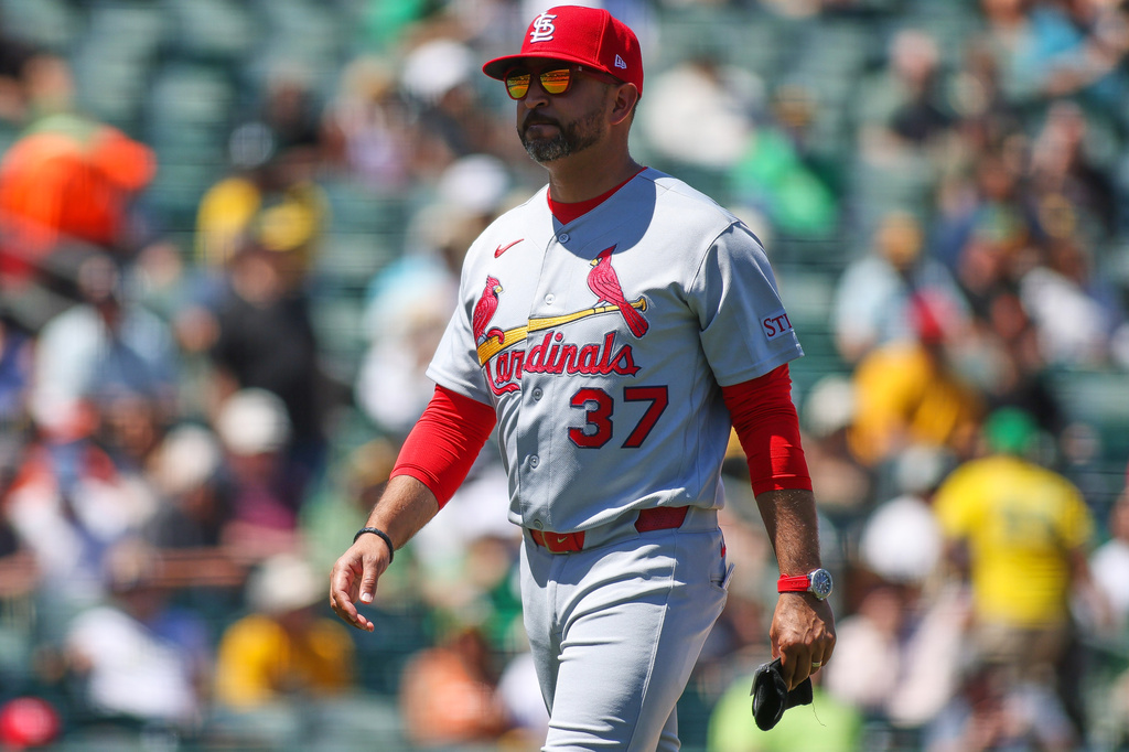 St. Louis Cardinals manger Oliver Marmol walks to the dugout after making a pitching change during the seventh inning of a baseball game against the Athletics, Thursday, May 14, 2026, in West Sacramento, Calif. (AP Photo/Scott Marshall)